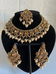 Gold Indian tikka earrings and necklace