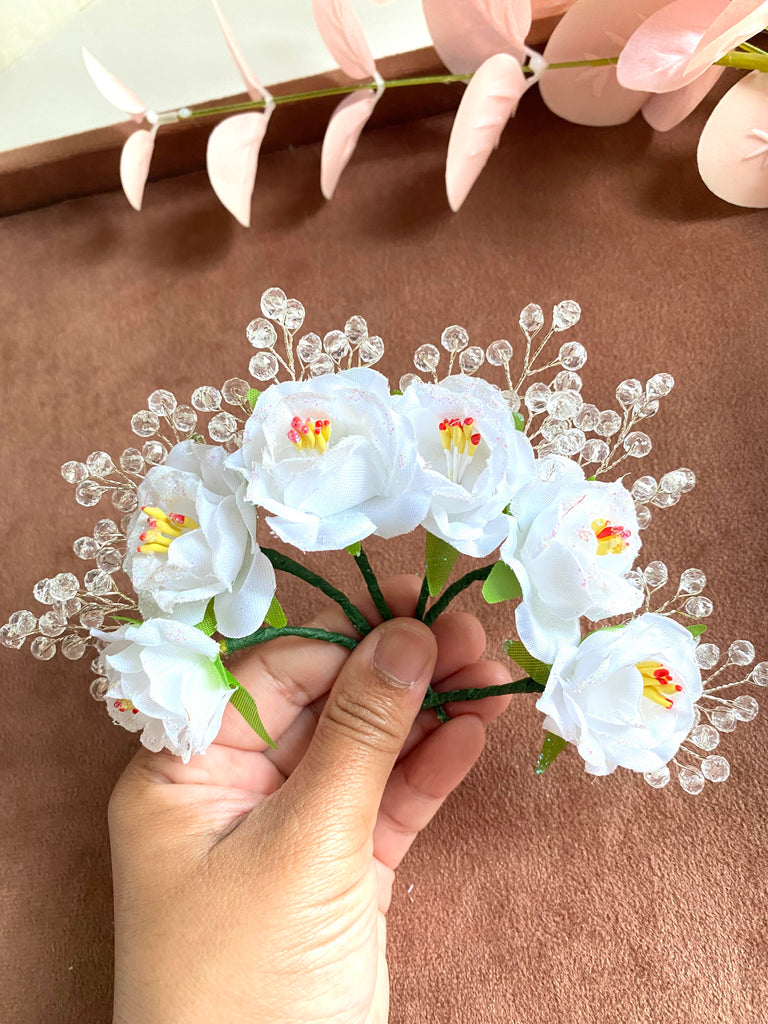 white flower pins