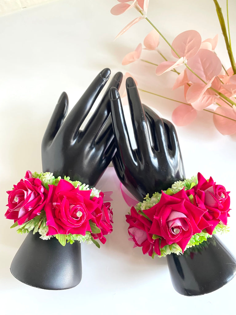 Pink artificial flower wristbands 