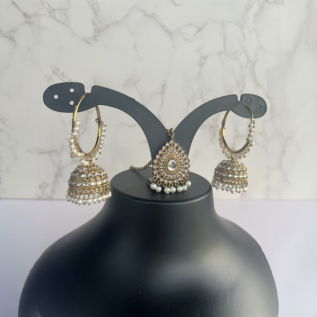 Gold Kundan earrings and tikka 