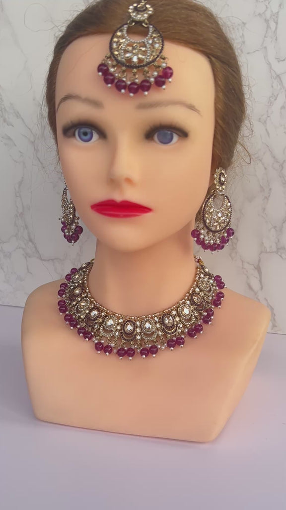 Gold and purple necklace tikka earrings set 