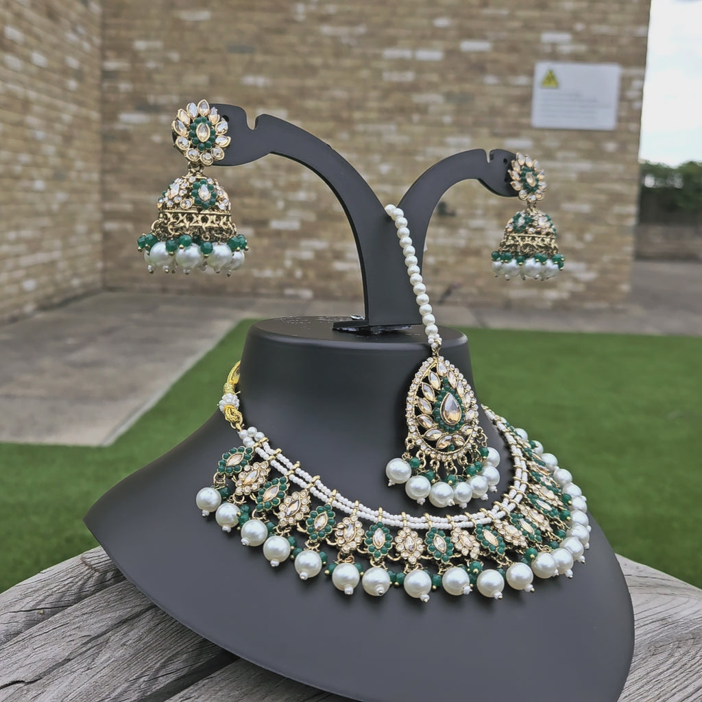 Green Kundan jhumka tikka earrings 