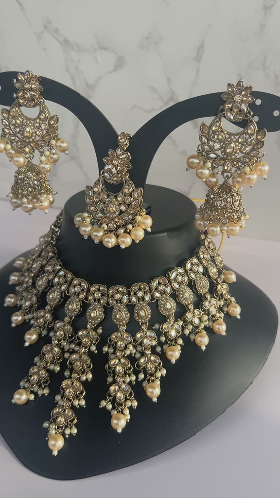 Desi gold necklace tikka earrings set
