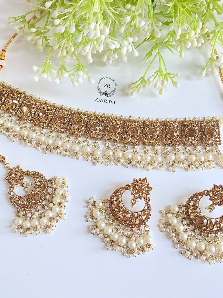 Pearl choker set with earring and tikka