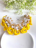 Yellow floral gajra with pearls details