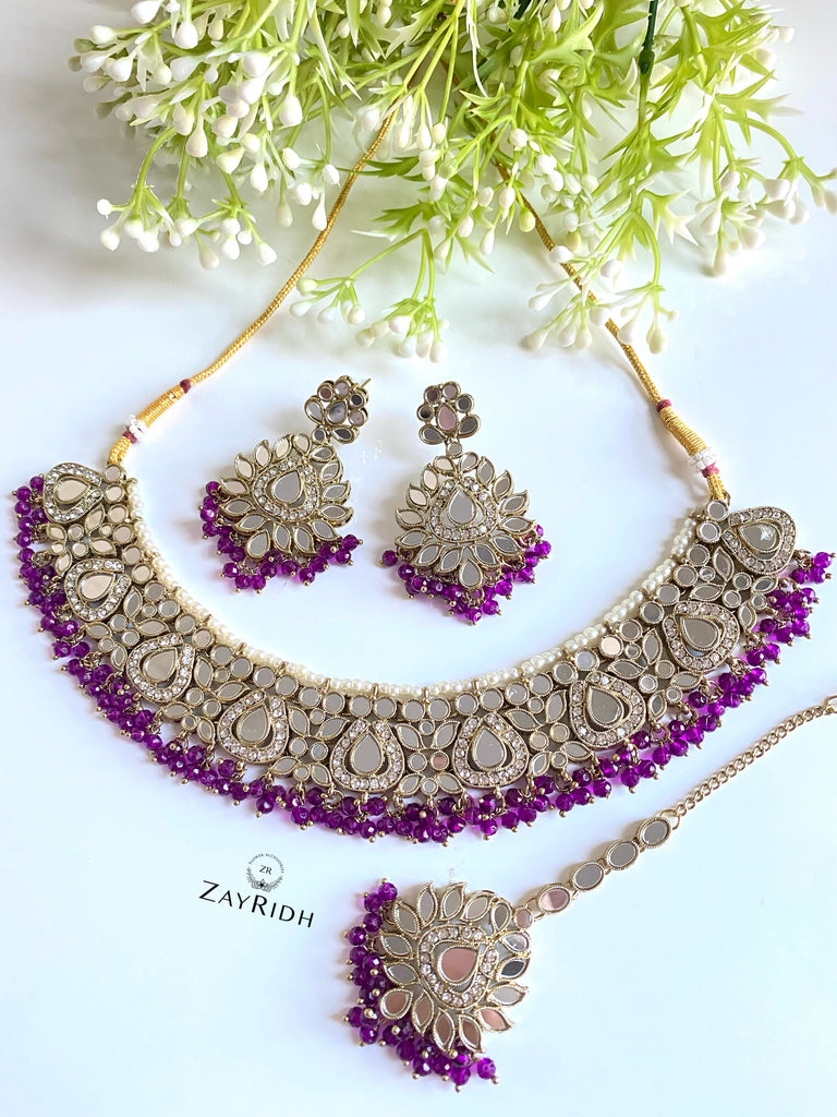 necklace earrings and tikka set