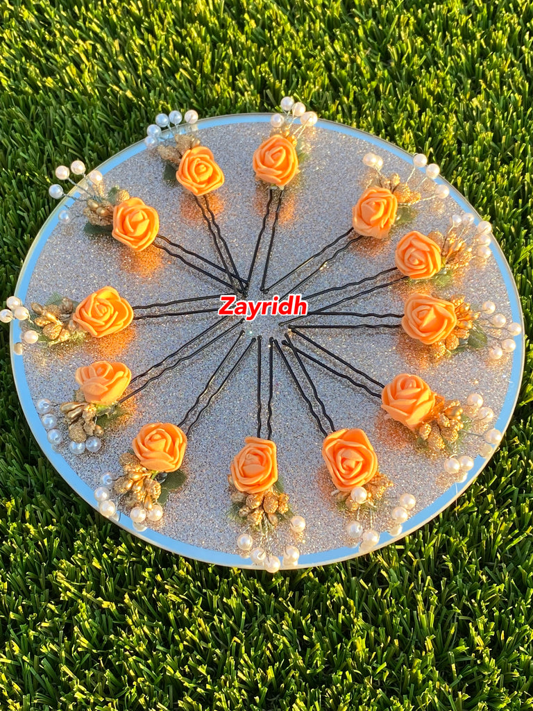 orange flower pins