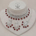 Indian wedding maroon necklace set with earrings and tikka