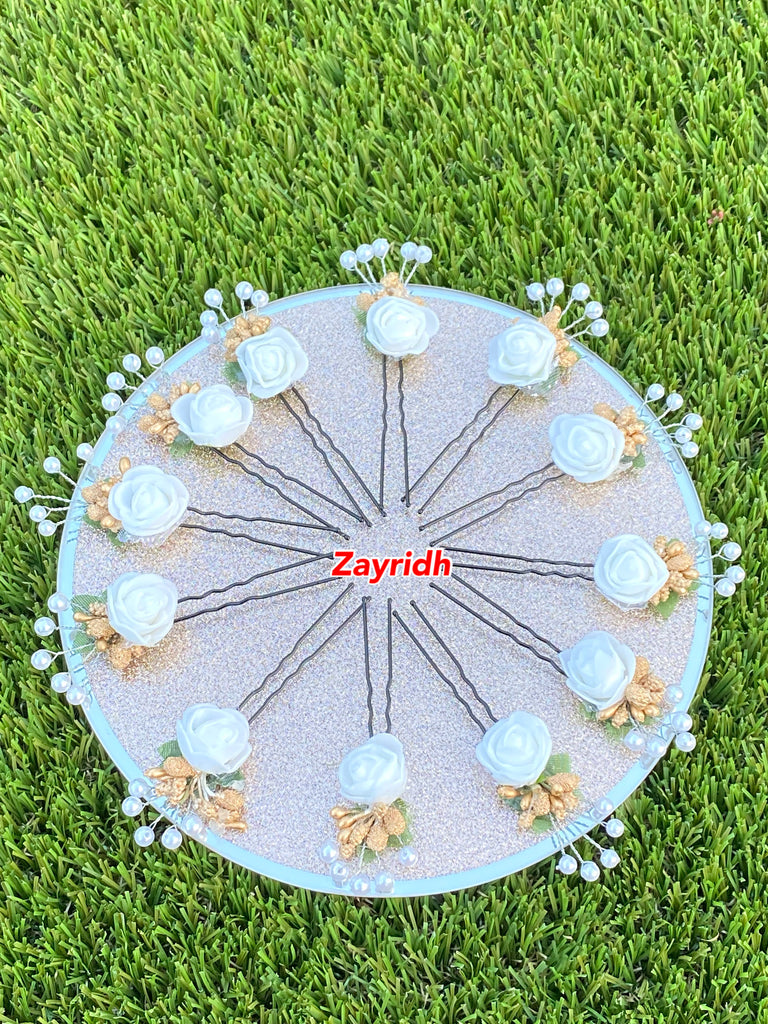 white flower pins