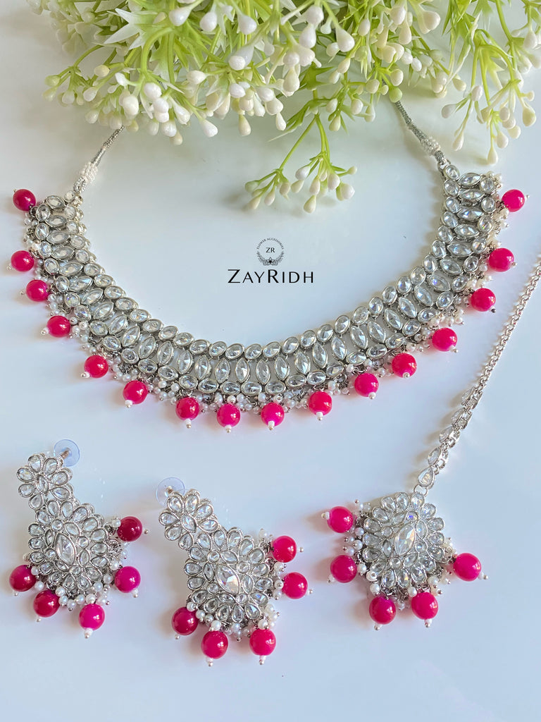 necklace earrings and tikka set